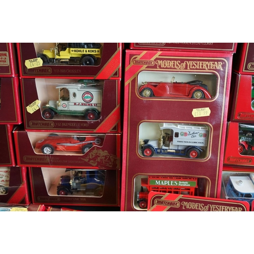 1145 - Around 69 boxed Matchbox Models of Yesteryear diecast models in red boxes, ex