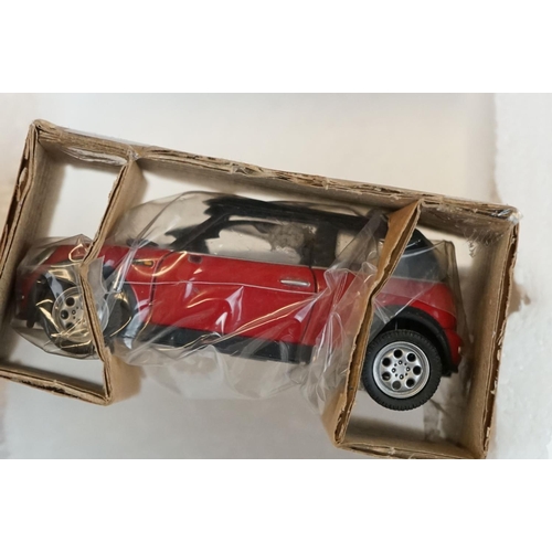 1150 - Three Boxed Corgi Mini Cooper 1:36 diecast model sets with certificates to include 2 x CC99109 Coope... 