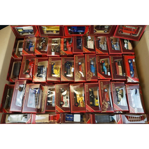 1166 - Around 75 boxed Matchbox Models of Yesteryear in red boxes, vg