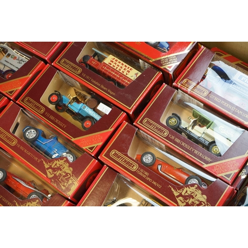 1166 - Around 75 boxed Matchbox Models of Yesteryear in red boxes, vg