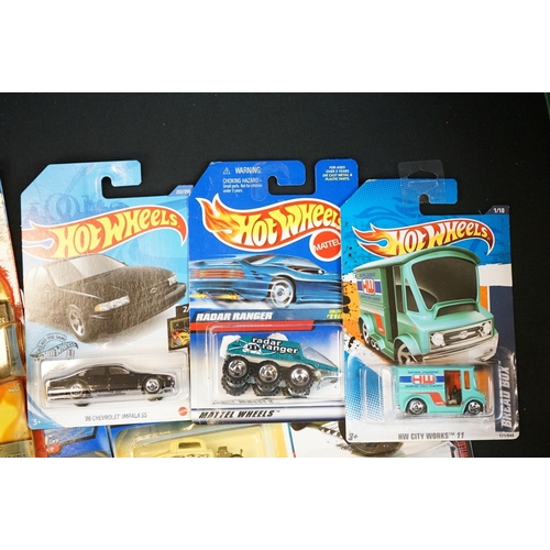 1179 - 54 Carded Mattel Hot Wheels diecast models (vg)