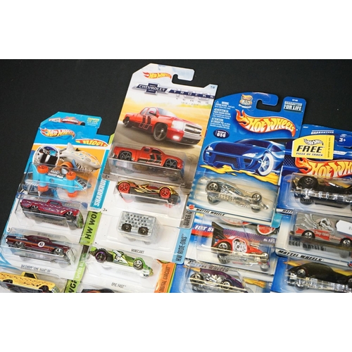 1179 - 54 Carded Mattel Hot Wheels diecast models (vg)