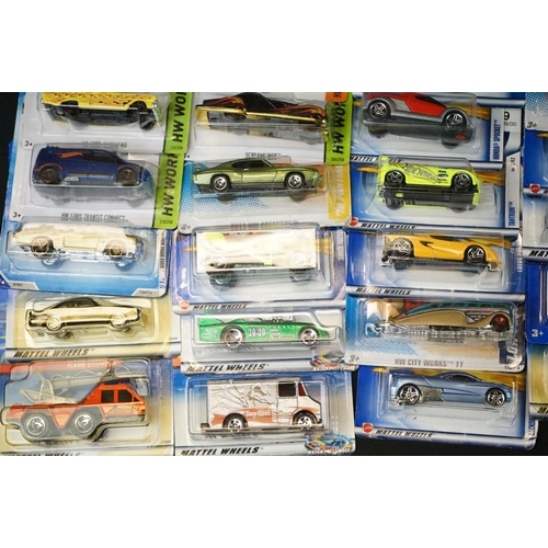 1179 - 54 Carded Mattel Hot Wheels diecast models (vg)