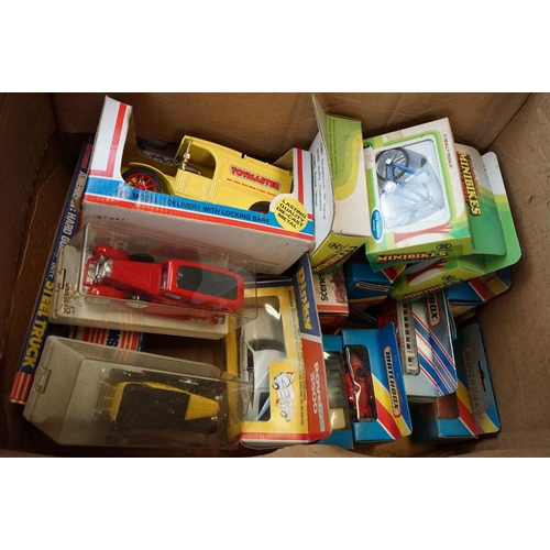 1186 - Around 45 boxed / cased diecast & plastic models to include Matchbox, Minialuxe, Friction Powered ex... 