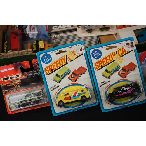 1224 - Around 40 boxed / carded diecast & plastic models to include Majorette, Corgi, Matchbox, Husky etc