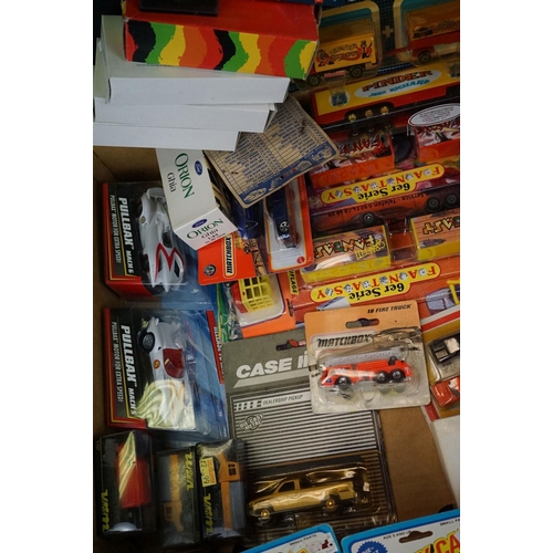 1224 - Around 40 boxed / carded diecast & plastic models to include Majorette, Corgi, Matchbox, Husky etc