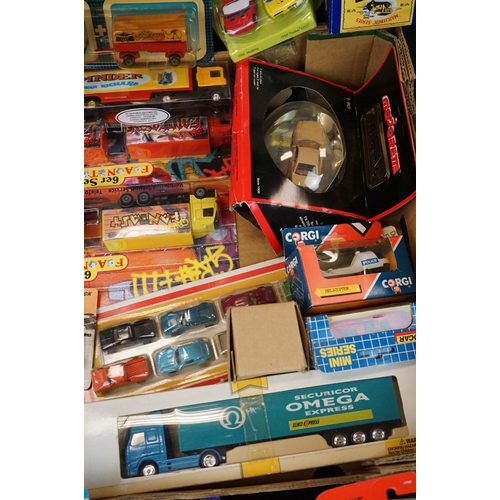 1224 - Around 40 boxed / carded diecast & plastic models to include Majorette, Corgi, Matchbox, Husky etc