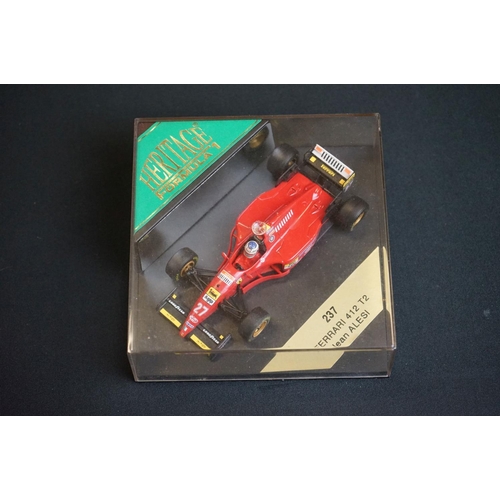 1229 - Seven cased Onyx Heritage Classics F1 models to include 5018 Benetton Ford Michael Schumacher, 5010 ... 