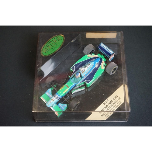 1229 - Seven cased Onyx Heritage Classics F1 models to include 5018 Benetton Ford Michael Schumacher, 5010 ... 