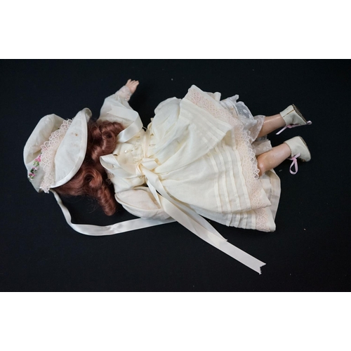 195 - Three early 20th C Armand Marseille bisque headed dolls to include 1 x with sleeping brown glass eye... 