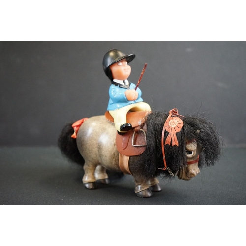 223 - Three Plastech Thelwell horses with rider figures, all variants in a good overall condition along wi... 