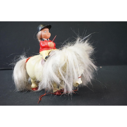 223 - Three Plastech Thelwell horses with rider figures, all variants in a good overall condition along wi... 