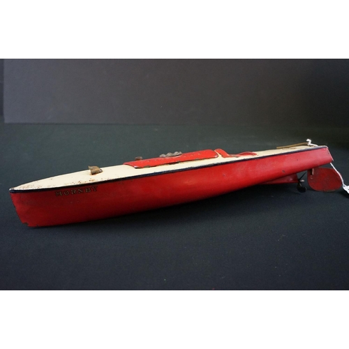 256 - Boxed Hornby Speed Boat, clockwork tin plate, in red & white with key, showing wear & rusting, tatty... 