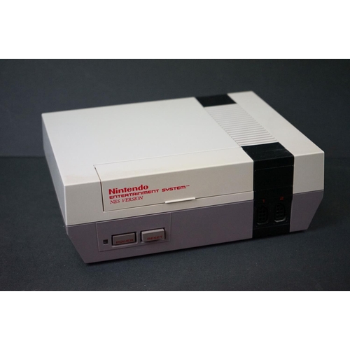264 - Retro Gaming - Nintendo NES console with 2 x controllers and 2 x boxed games to include Donkey Kong ... 