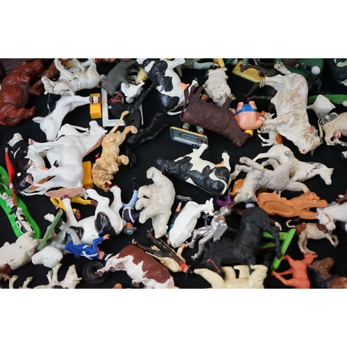 276 - Around 60 Britains plastic figures, together with a group of Britains fences & other plastic figures