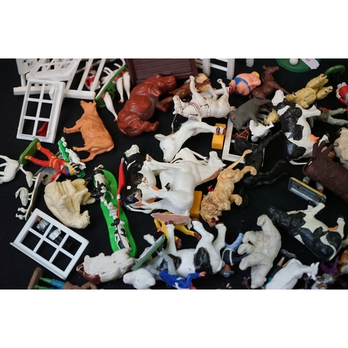 276 - Around 60 Britains plastic figures, together with a group of Britains fences & other plastic figures