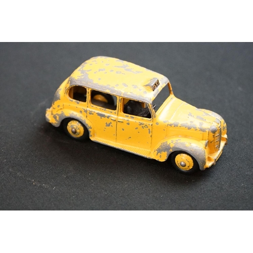 1263 - Six Mid 20th C play worn diecast models to include 5 x Dinky (582 Pullmore Transporter, 175 Hillman ... 