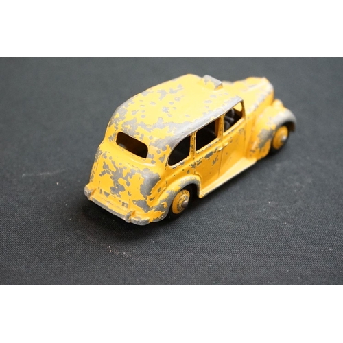 1263 - Six Mid 20th C play worn diecast models to include 5 x Dinky (582 Pullmore Transporter, 175 Hillman ... 