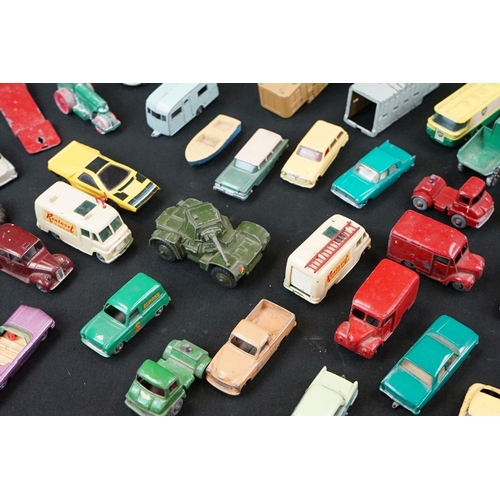 1264 - Around 40 mid 20th C play worn Matchbox Lesney diecast models plus roadside accessories