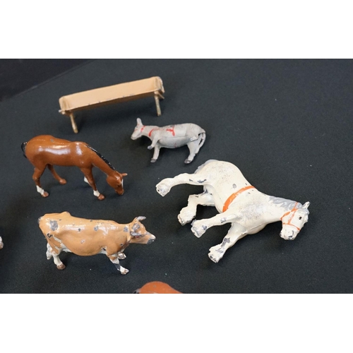 1369 - Small quantity of mid 20th C Britains play worn metal figures, mainly farm animals, featuring a milk... 