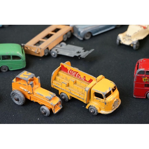 1291 - 22 Mid 20th C play worn Matchbox Lesney diecast models to include road & commercial examples plus a ... 