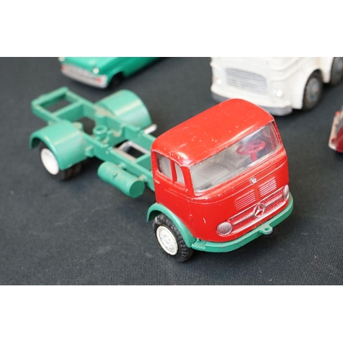 1296 - 10 Mid 20th C diecast / tin plate models to include Tekno 817 Lloyd in pink, Tekno Volvo 810 in grey... 