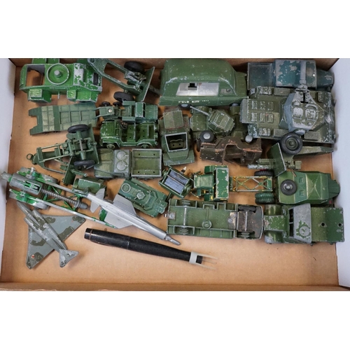 1298 - Around 25 play worn mid 20th C military diecast models to include mainly Dinky examples and a Triang... 