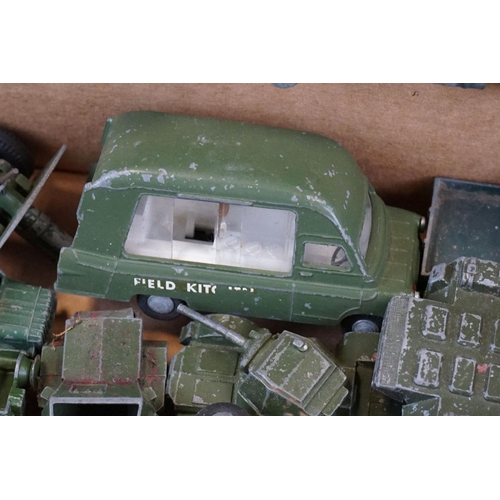 1298 - Around 25 play worn mid 20th C military diecast models to include mainly Dinky examples and a Triang... 