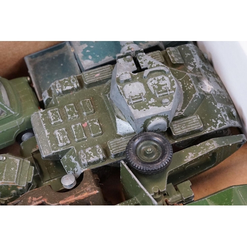 1298 - Around 25 play worn mid 20th C military diecast models to include mainly Dinky examples and a Triang... 