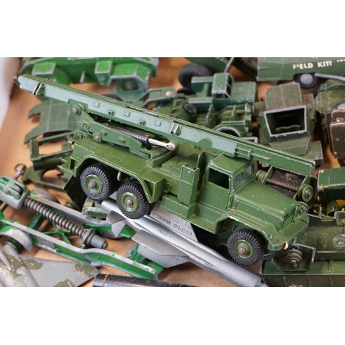 1298 - Around 25 play worn mid 20th C military diecast models to include mainly Dinky examples and a Triang... 