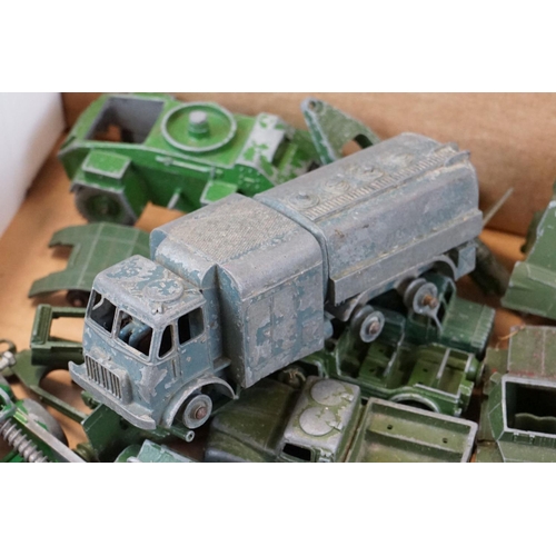 1298 - Around 25 play worn mid 20th C military diecast models to include mainly Dinky examples and a Triang... 