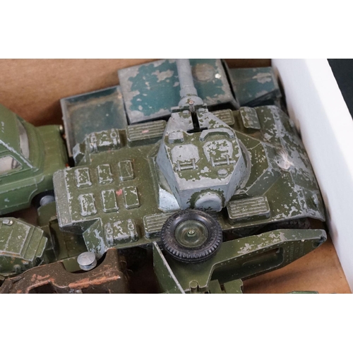 1298 - Around 25 play worn mid 20th C military diecast models to include mainly Dinky examples and a Triang... 