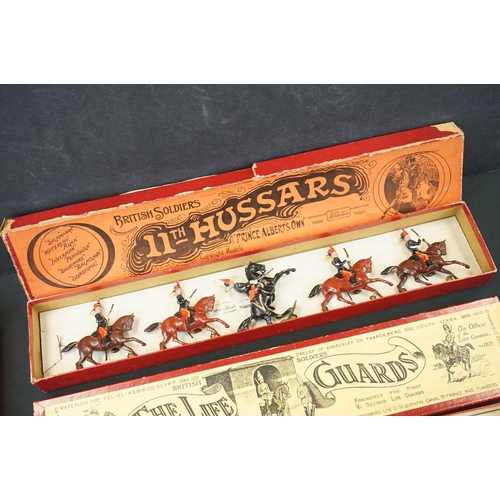 1390 - Four boxed Britains metal figure sets to include No 12 11th Hussars, No 4 2nd Lifeguards, No 24 9th ... 