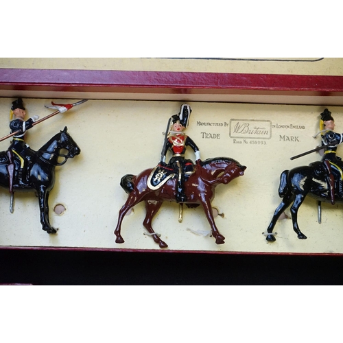 1390 - Four boxed Britains metal figure sets to include No 12 11th Hussars, No 4 2nd Lifeguards, No 24 9th ... 