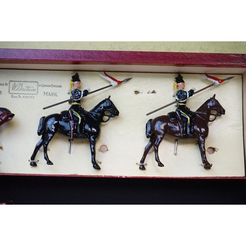 1390 - Four boxed Britains metal figure sets to include No 12 11th Hussars, No 4 2nd Lifeguards, No 24 9th ... 