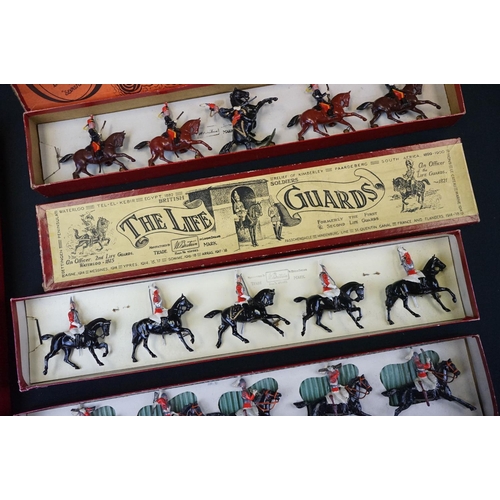 1390 - Four boxed Britains metal figure sets to include No 12 11th Hussars, No 4 2nd Lifeguards, No 24 9th ... 