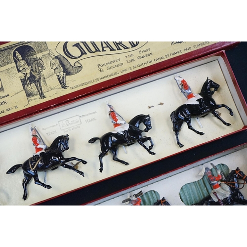 1390 - Four boxed Britains metal figure sets to include No 12 11th Hussars, No 4 2nd Lifeguards, No 24 9th ... 