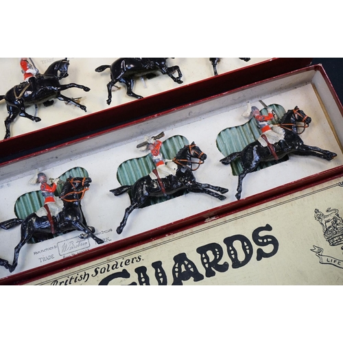 1390 - Four boxed Britains metal figure sets to include No 12 11th Hussars, No 4 2nd Lifeguards, No 24 9th ... 