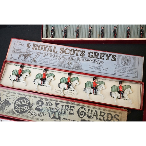 1393 - Four boxed Britains metal figure sets to include No 1537 Territorial Army Marching Slope Arms, No 19... 