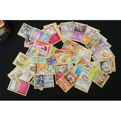 378 - Quantity of Pokémon trading cards contained within a Pokémon tin and Pokémon binder, including a sma... 