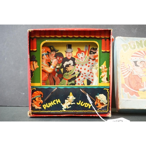 393 - Boxed Peter Pan Series Punch & Judy tinplate game, includes moveable Punch & Judy house within a tin... 