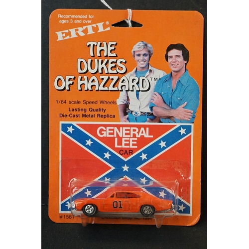 394 - Two carded ERTL Dukes of Hazard diecast models to include General Lee and Boss Hogg's Cadillac (unpu... 