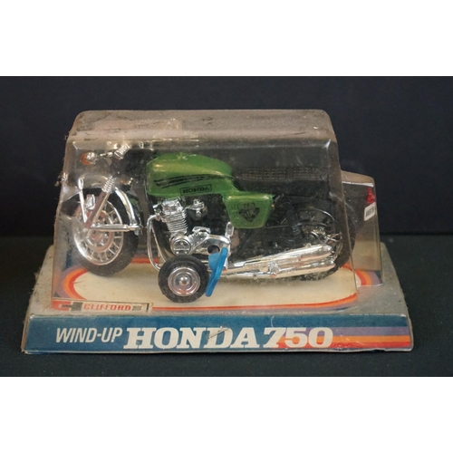 1300 - Five boxed diecast & plastic model motorbikes to include 3 x Polistil (750 GT55, 114 Suzuki RH70 & 1... 