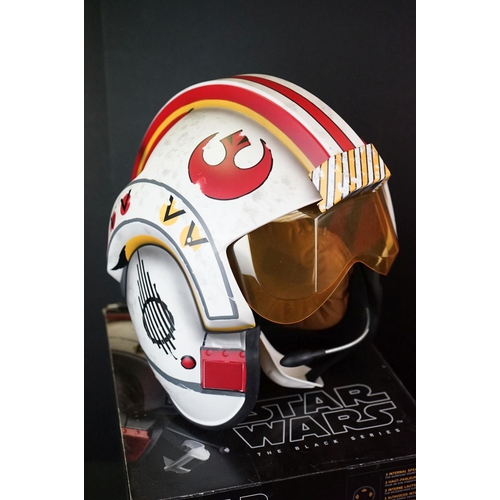 248 - Star Wars - Two boxed Hasbro The Black Series Battle Helmets to include Poe Dameron Electronic Helme... 