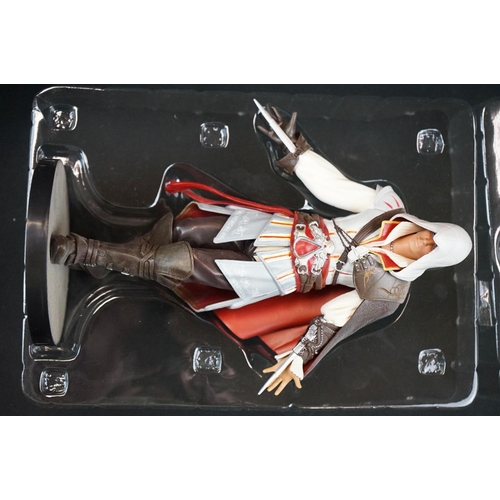 284 - Two boxed Assassins Creed figures to include AC2 Xbox 360 White Edition Ezio Auditore (figure & box ... 