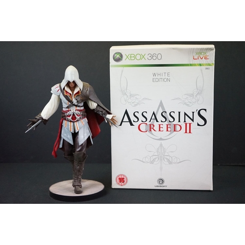 284 - Two boxed Assassins Creed figures to include AC2 Xbox 360 White Edition Ezio Auditore (figure & box ... 