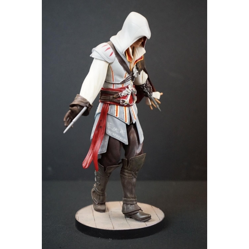 284 - Two boxed Assassins Creed figures to include AC2 Xbox 360 White Edition Ezio Auditore (figure & box ... 