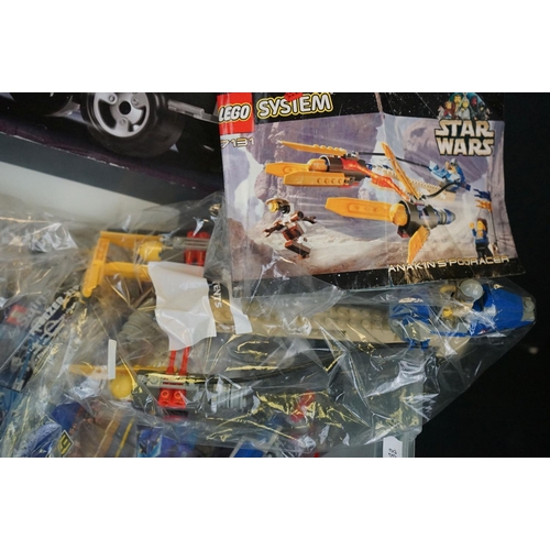 310 - Lego - 3 Boxed Lego vehicle sets together with a quantity of loose Lego, to include 2 x boxed & seal... 