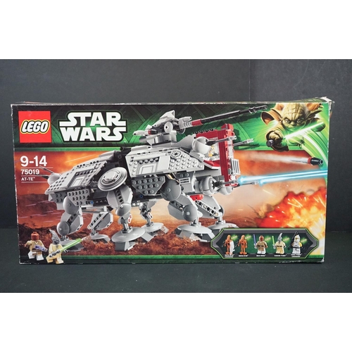 312 - Lego - Three boxed Lego Star Wars sets to include 7965 Millennium Falcon, 75019 AT-TE & 7931 Jedi T-... 