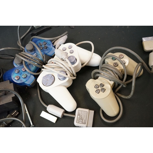 347 - Retro gaming - Two Sony Playstation One PS1 consoles with 2 PS1 controllers, an unofficial controlle... 